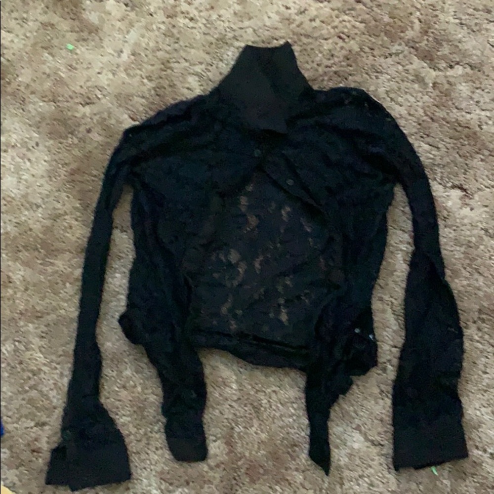 I’m selling a see though black cuff shirt!